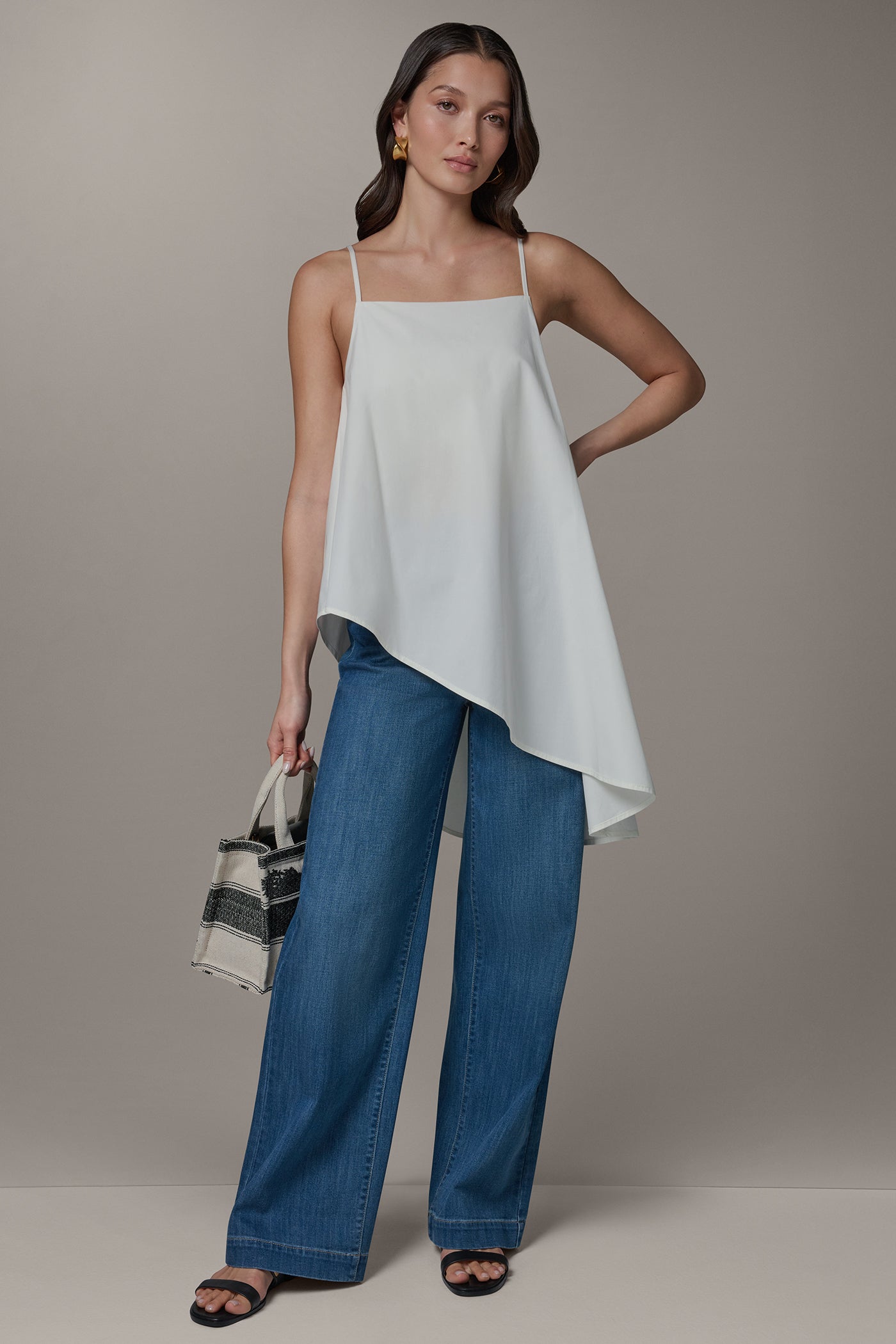 SLEEVELESS ASYMMETRIC TIE BACK BLOUSE