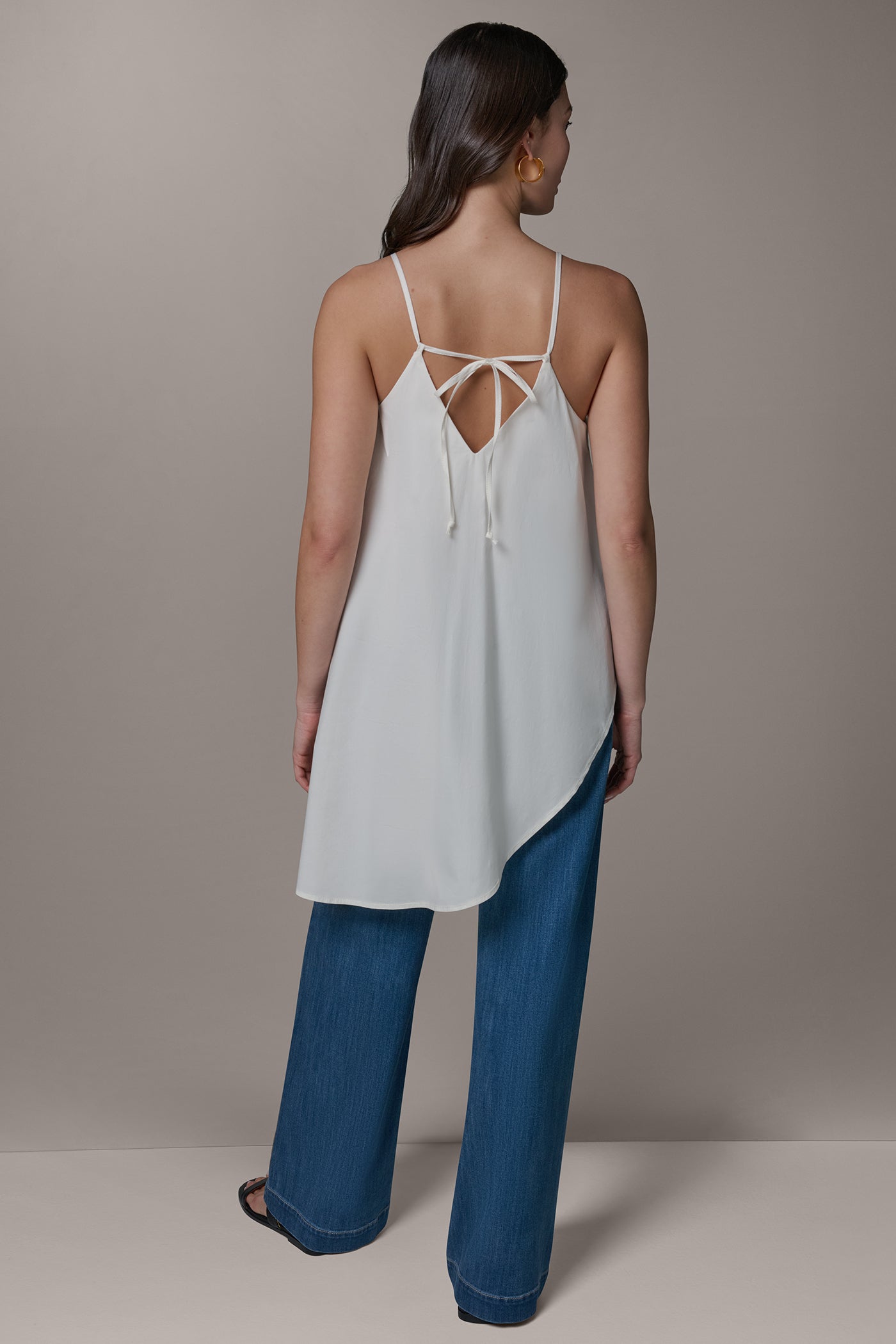SLEEVELESS ASYMMETRIC TIE BACK BLOUSE