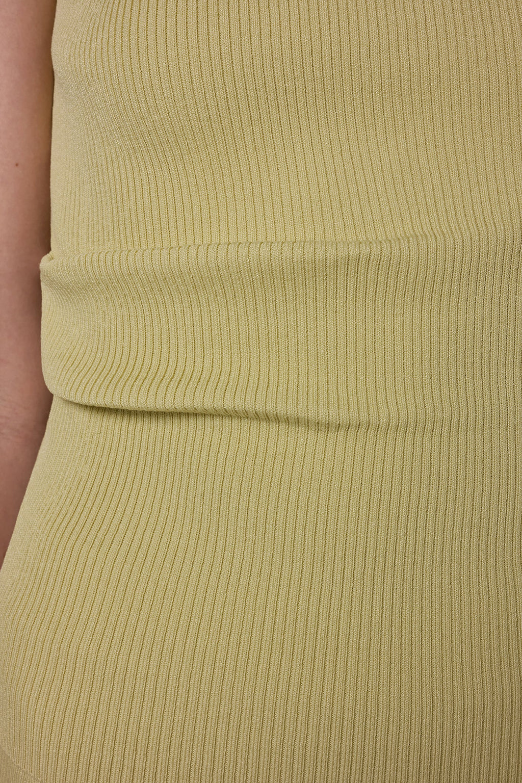SLEEVELESS ASYMMETRIC BOATNECK SWEATER