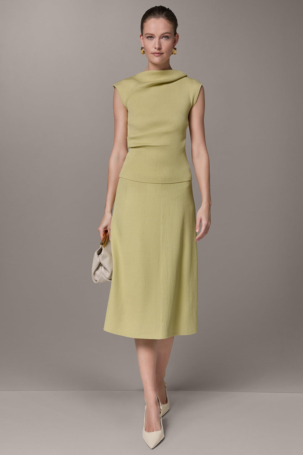 SLEEVELESS ASYMMETRIC BOATNECK SWEATER