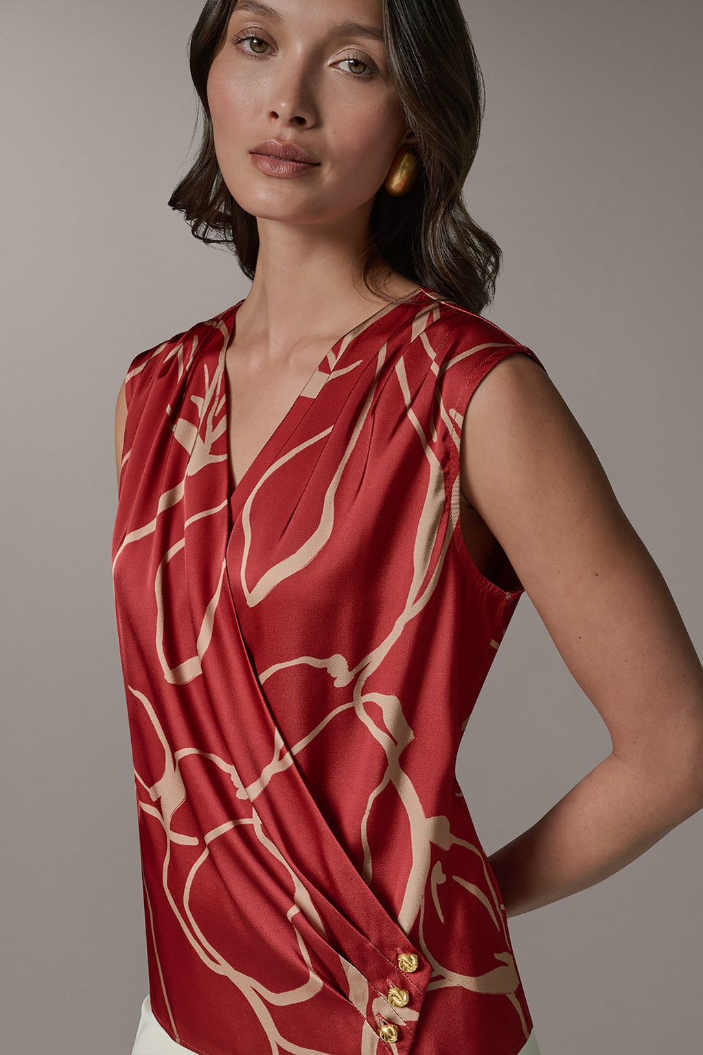 SLEEVELESS WRAP EFFECT PRINT BLOUSE