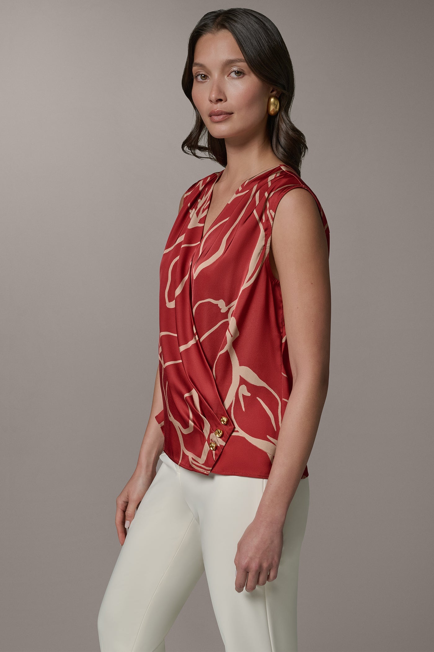 SLEEVELESS WRAP EFFECT PRINT BLOUSE